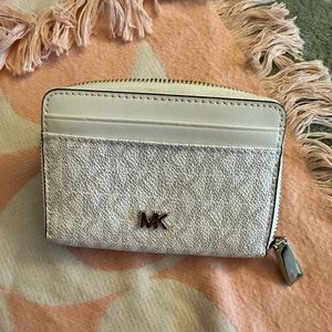 Michael Kors small zippy wallet. Ask me about a deal… with the beautiful tote.